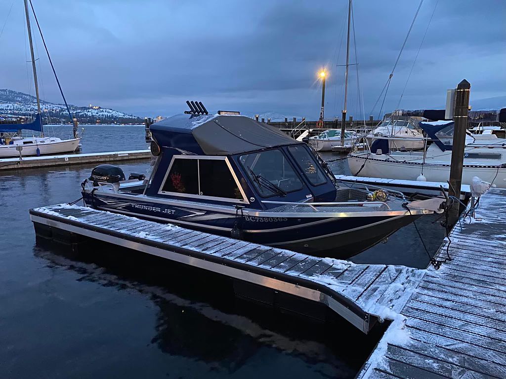 The boat at the dock at dusk